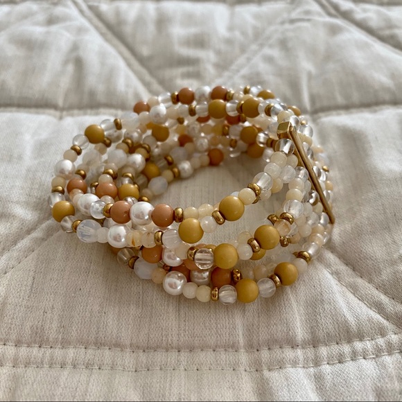 MULTI STRAND BEAD BRACELET IN WHITE TAN AND GOLD - Picture 6 of 7